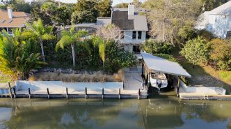Aerial view of waterfront property at 124 Godfrey Road, Edgewater, FL